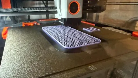 Printed parts on the 3D printer bed
